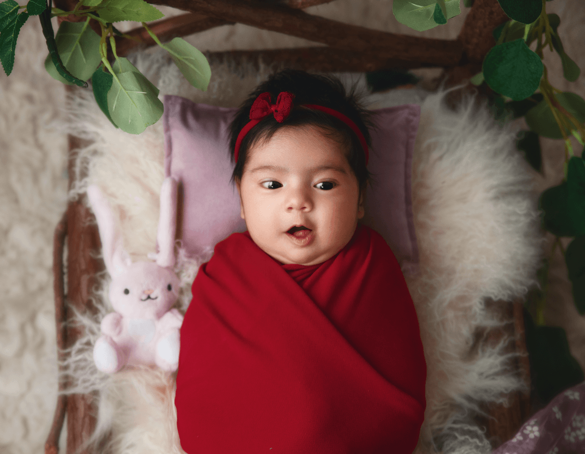 Artistic newborn photograph of a sleeping baby 16